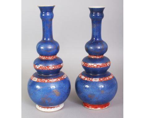 A GOOD PAIR OF CHINESE KANGXI PERIOD POWDER-BLUE GROUND & IRON-RED TRIPLE GOURD PORCELAIN VASES, circa 1700, each decorated i