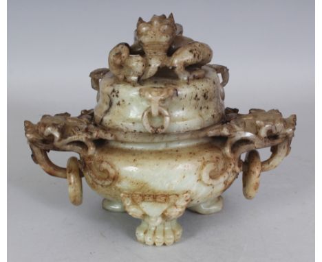 A 20TH CENTURY CHINESE CELADON & RUSSET JADE TRIPOD KORO & COVER, with dragon handles and finial, each section also with loos