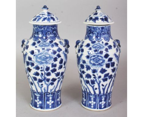 A PAIR OF 19TH CENTURY CHINESE BLUE & WHITE PORCELAIN VASES & COVERS, each painted with opposing pairs of birds and growths o
