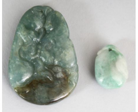 A CHINESE GREEN JADE PENDANT, of tear drop form, carved in shallow relief with lingzhi and peach, 1.8in x 1.25in; together wi