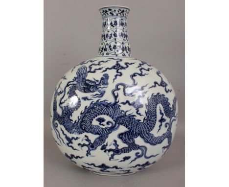 A LARGE CHINESE MING STYLE BLUE & WHITE DRAGON MOON FLASK, each domed surface decorated with a dragon amidst flame and cloud 