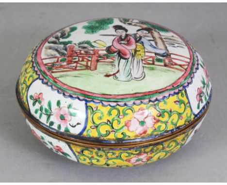 A CHINESE CANTON ENAMEL CIRCULAR BOX & COVER, the base with a four-character Qianlong mark, 3.1in diameter & 1.7in high overa