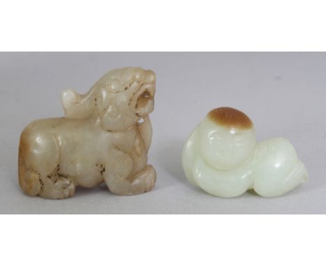 TWO SMALL CHINESE JADE CARVINGS, one in the form of a mythical animal, the other of a resting boy, 1.4in & 1.3in long. (2)