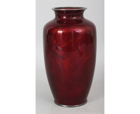 AN EARLY 20TH CENTURY JAPANESE RED GROUND GIN BARI VASE, decorated in foil beneath the enamel with birds and bamboo, the rims