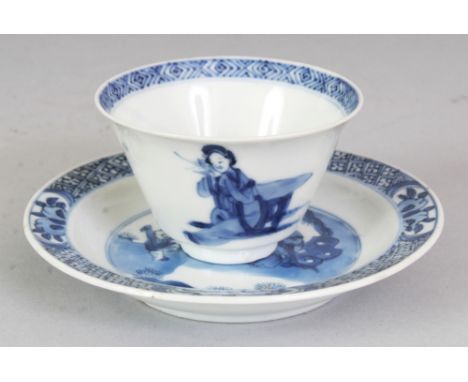 A FINE QUALITY CHINESE KANGXI PERIOD BLUE & WHITE PORCELAIN TEABOWL & SAUCER, circa 1700, each piece painted with a seated la