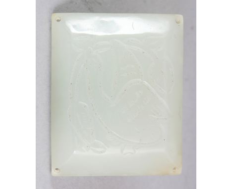 A SMALL CHINESE CELADON JADE RECTANGULAR PLAQUE, carved to one surface with a bird clasping a frond in its beak, 1.75in x 1.2