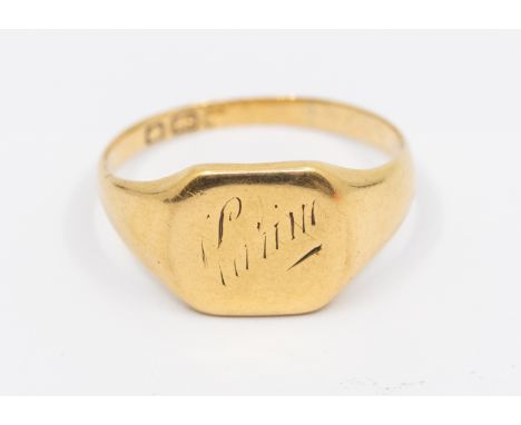 An 18ct gents signet ring, comprising a cushion shaped top, engraved to top, inscription to interior, size L1/2, weight appro