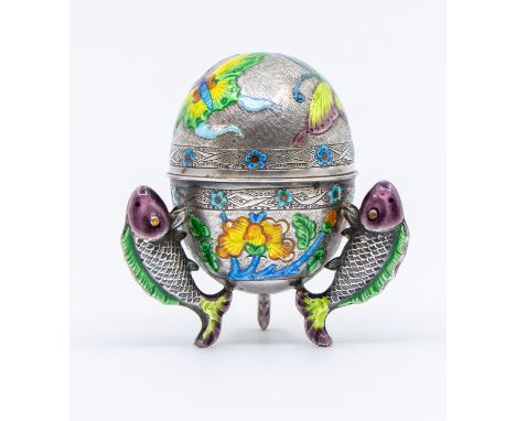 A 20th century probably Continental white metal egg shaped trinket pot, with detachable top, engine turned decoration and vib