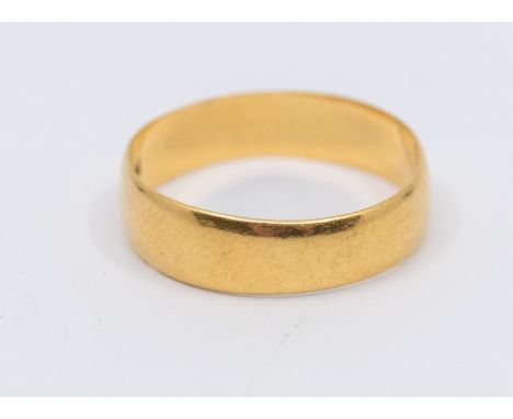 A light weight 22ct gold wedding band, width approx 5mm, size N, weight approx  2.7gms  Further  details: good minor wear and