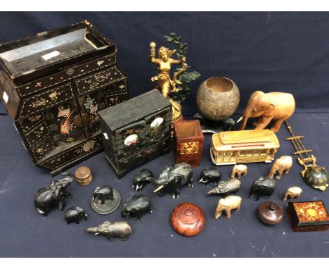 A collection of treen items, i.e. walnut pots, elephants, coconut pot, two small mid 20th century Chinese lacquered tabletop 