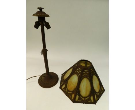 An early 20th century cast metal and glass lamp base and shade, later rewired. (Not tested)