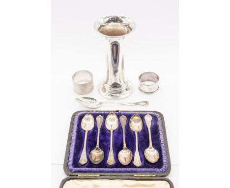 A collection of silver to include; a tall weighted Edwardian silver posy vase, of trumpet form, hallmarked probably Deakin & 