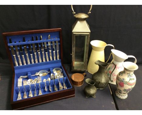 Boxed cutlery sets, decorative metal jugs, stainless steel lamp