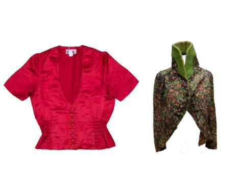 A 1960s 'Chelsea Girl' satin blouse in tomato red, it has a very low V neckline and fastens with 8 button centre front, smock