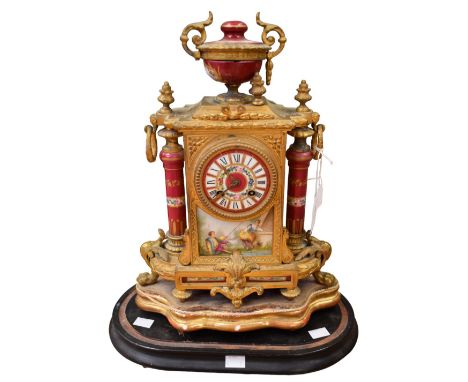 A Continental probably French ceramic dial and detailed gilt brass mantel clock, decorated with figural design and with gilt 