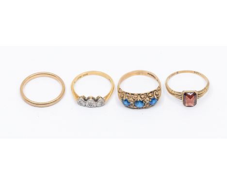 A collection of four gold rings, to include a a diamond set 18ct gold band, comprising three heart shaped platinum settings s