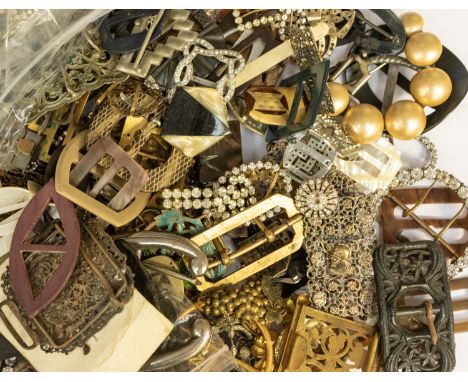 A large collection of antique/vintage buckles, including various sizes, designs and materials, including cut steel, paste set