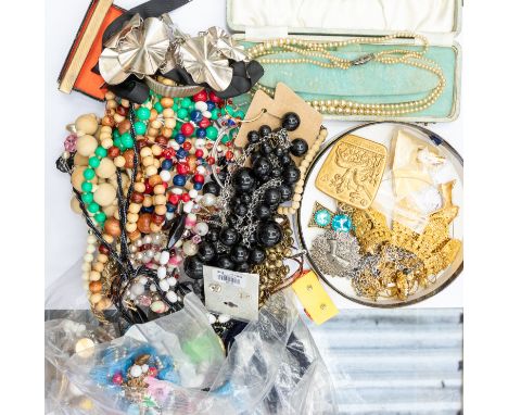 A collection of vintage costume jewellery to include various plastic and glass bead necklaces, paste set jewellery including 