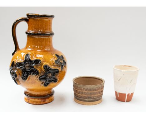 A small collection of decorative ceramics to include: a large 1960s West German Carstons single-handled abstract mustard glaz