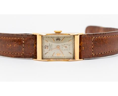 Longines- a gentleman's vintage 18ct gold cased wristwatch,  circa 1930's, comprising a signed silvered rectangular dial with