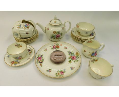 A Royal Worcester "Roanoke" patterned tea set consisting of tea pot, milk jug, sugar bowl, six cups and saucers, six side pla