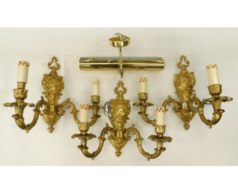 Collection of three matching brass regency style two branch candle wall lights along with a brass over picture lamp.