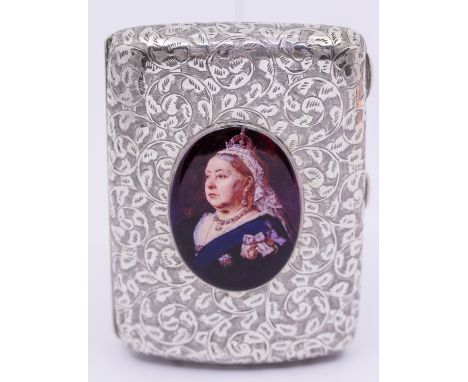 A late Victorian silver and enamel cigarette case, the body profusely engraved with foliage, the centre inset with a portrait