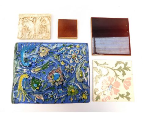 A small collection of mixed late 19th/early 20th Century ceramic tiles to include; a dark brown glazed Pilkington's, a smalle