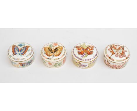 Royal Crown Derby - A collection of 4 boxed "Butterflies of the World" trinket boxes.