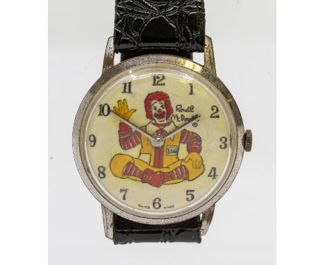A novelty Ronald McDonald vintage wristwatch, comprising a round dial with painted 'Ronald' white metal case, aprox 33mm, man