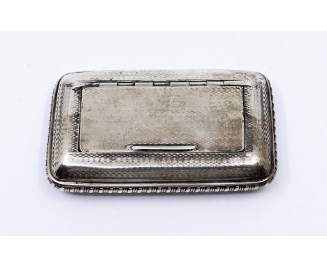 A George III silver cushion shaped snuff box, hinged cover, gadroon border, the entire engraved linear decoration, hallmarked