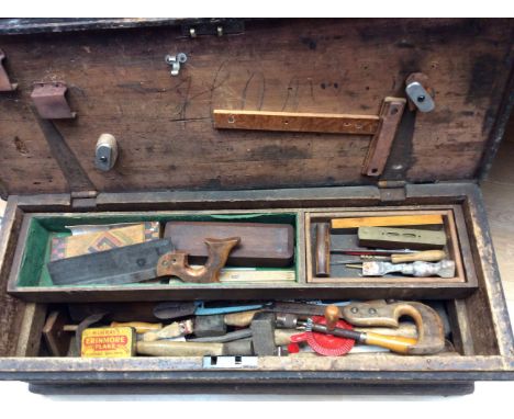  Tool chest with various tools to include saws, hammers and chisels etc.