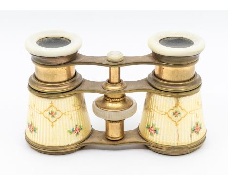 A pair of late 19th/early 20th century opera glasses, possibly French, of yellow metal and enamel with mother-of-pearl