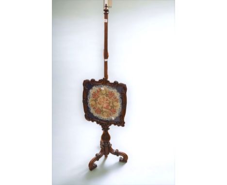 A 20th Century fire screen with embroidered detail to detachable top (missing holding screw)