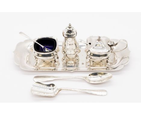 A matched Queen Elizabeth II silver condiment set consisting salt cellar, pepperette, mustard pot and two spoons, the mustard