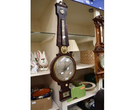 A George III banjo barometer in mahogany by L Frederick of Walsall and Bilston.