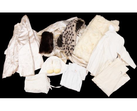 A 1940s white rabbit fur stole. A faux fur white /spotted collar/tippet and a dark brown fur tippet, 1950. A tulle decorative