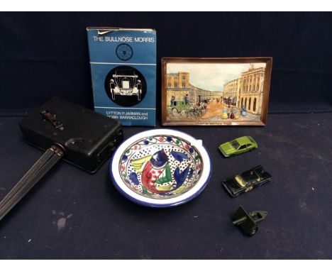  A mixed lot to include; a Cine Kodak USA made cine recorder/camera on a tripod base, along with a 20th century ceramic plaqu