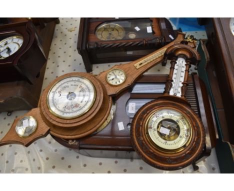 A mid 20th century mahogany 8-day wall clock, an early 20th century wall barometer and a late 20th century wall barometer