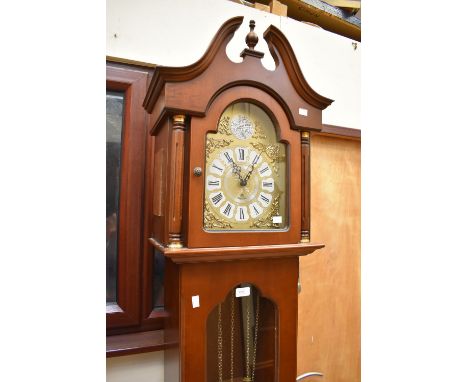 A mid 20th century German 'Tempus Fugit' longcase clock with three weights