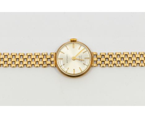 A ladies 9ct gold Rotary wristwatch, comprising a round signed silver dial with applied baton indices, case approx 22mm, to a