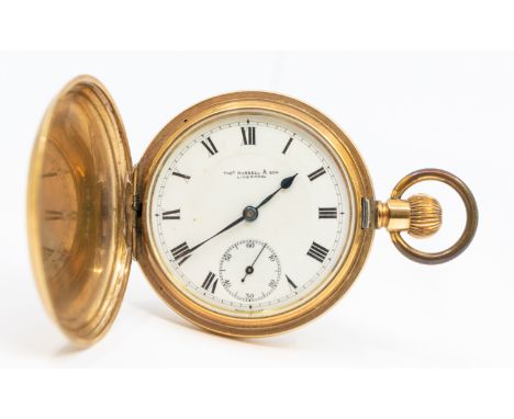 A gold plated hunter pocket watch by Thos Russell & Son, Liverpool, comprising a white enamel signed dial with numeral marker