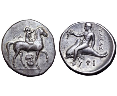 Calabria, Tarentum AR Nomos. Circa 320-315 BC. Nude youth on horse pacing to right, wreath in outstretched right hand to crow