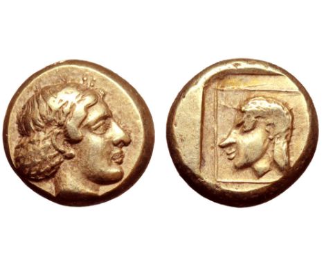 Lesbos, Mytilene EL Hekte. Circa 412-378 BC. Head of Artemis-Kybele right, hair in sakkos / Head of Telchine left, hair in sa