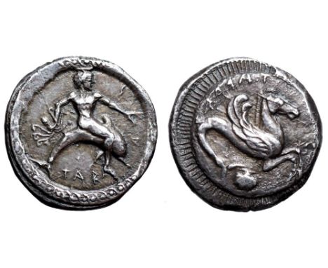 Calabria, Tarentum AR Nomos. Circa 500-490 BC. Taras astride dolphin to right, holding octopus in his right hand and phiale i