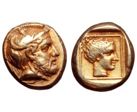 Lesbos, Mytilene EL Hekte. Circa 412-378 BC. Bearded head of Ares right, wearing crested helmet decorated with griffin / Head