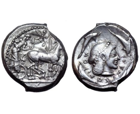 Sicily, Syracuse AR Tetradrachm. Deinomenid Tyranny. Time of Hieron I, circa 475-470 BC. Charioteer, holding kentron and rein