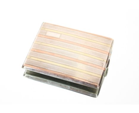 An American sterling cigarette case, stamped Sterling 14k, with yellow metal banded and engine turned decoration