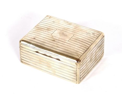 A silver engine turned decorated cigarette box, 11cm long