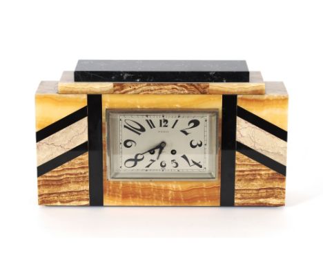 An Art Deco French marble mantel clock, the silvered oblong dial inscribed "Prieur Brest", 43cm long x 25cm high